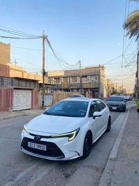 كورولا شكل الأمريكي هايبرد السياره فول فول  مواصفات بدون اي نقص جاهزه ...