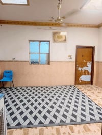 النجف حي الجزيرة • ١٠٠م • غرفة وصالة