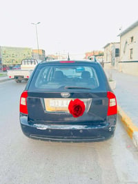 🚘 كيا كارنز 2009 للبيع السيارة ترايها للبصرة، وحالتها جيدة: 🔹 حدادة جد...