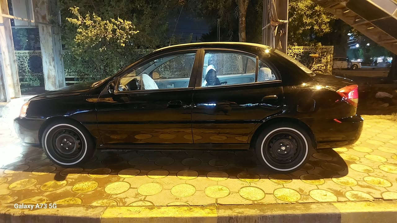كيا ريو • ٢٠٠٤ • رقم بغداد انكليزي