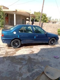 بيجو 306 • رقم بغداد • مصبوغة