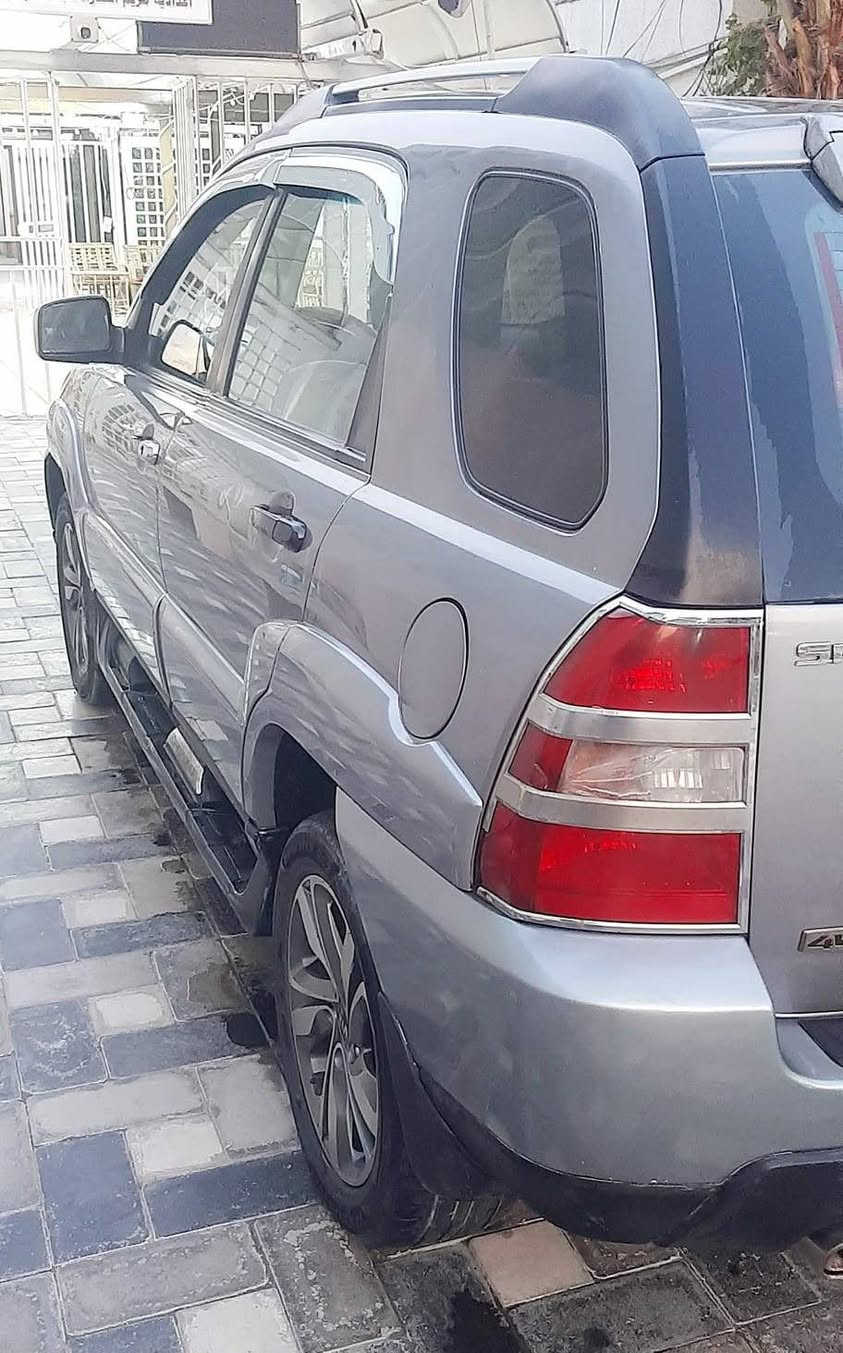 سبورتج ٢٠٠٩ رقم انكليزي بغداد باسمي سيارة جاهزة ضررها جاملغ وبنيد مصبوغ فتحة سقف تبريد شاشة حساسات خلفية كاميرة تخم تاير ويل كب حديث كشنات جلد مطعم لايت زنزن بلوجكتر زنون محرك ٢٧٠٠ ترهم مراوس انترا المقدس بغداد رقم الهاتف ***********
