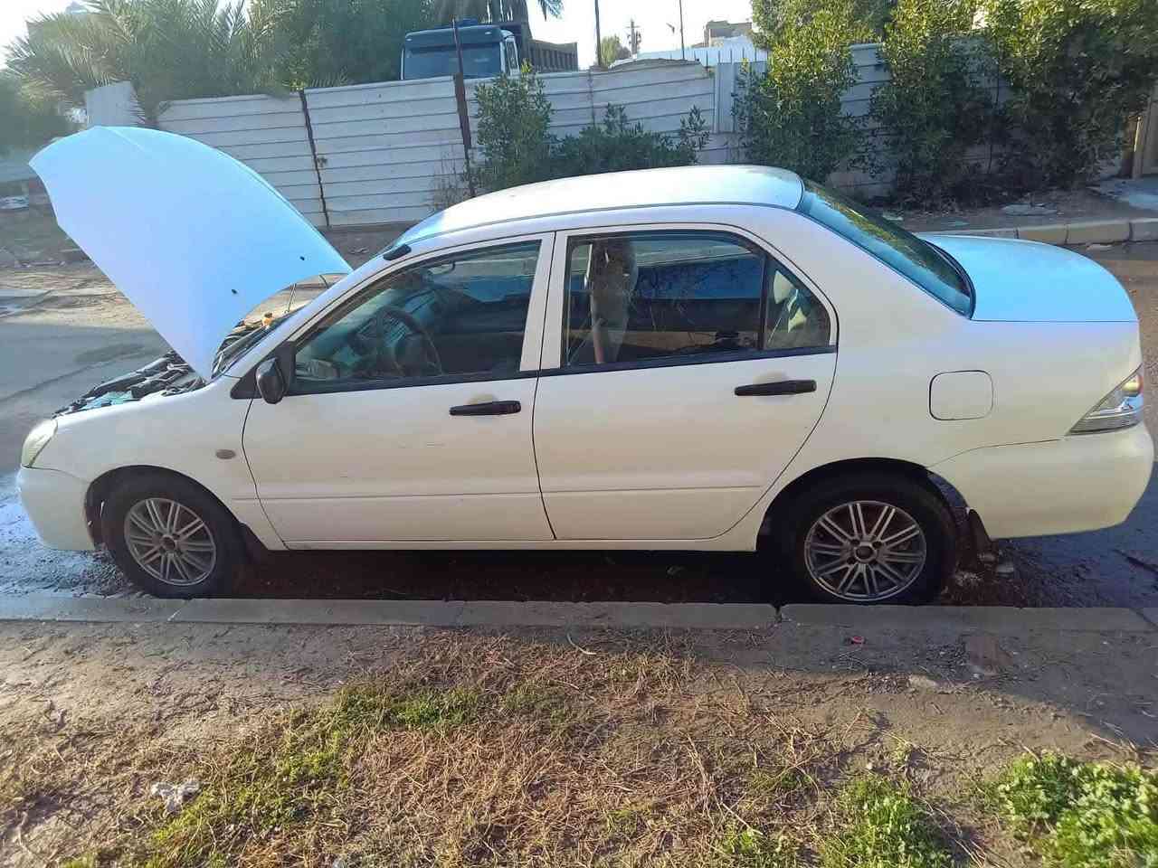 سلام عليكم لانسر موديل 2006 محرك 1300 تبريد ثلج لاستفسار ***********
