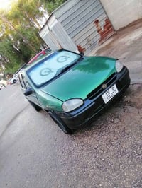 للاتصال 07704365402 سياره opel صالون اخضر زيتوني  اوتو ماتيك موديل 199...