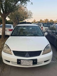 لانسر • ٢٠١١ • فتحة سقف