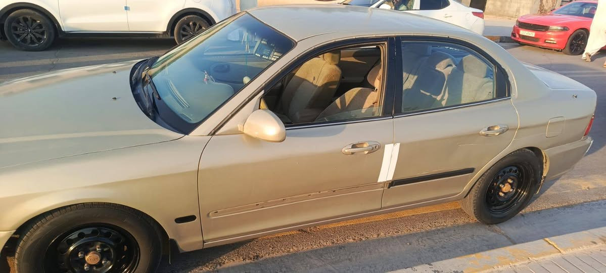 اوبتيما 2004 محرك كير حدد كهربايات تبريد تدفئه كله شغاله حداديه اهم تاير جديد جديده غرفه حلوه داخل عسلي محوك 6 رقم انكليزي بسمي سعر 60
***********
