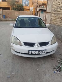 لانسر • ٢٠١٠ • اوتوماتيك
