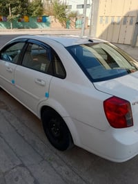 ئةم سةيارة بؤ فڕؤشتن 2011 گێر و مةكينة و تةبريد بة شةرت رةقةم و سةنةوي...
