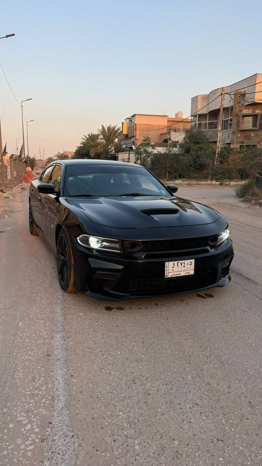 السلام عليكم ورحمة الله
دودج جارجر سكات باك (Dodge Charger Scat Pack) — موديل 2021
 الممشى: 35 ألف ميل (56 ألف كم) قابل للزيادة.
 السيارة ستوك بالكامل، محرك كير بلاد لا مفتوح ولا ملعوب بيه نهائياً، بدون أي إضافات أو تزويد، رقم بغداد الجديد باسمي تحويل مباشر.
 الحادث فقط قطعة واحدة تبديل (صور الحادث مرفقة بالمنشور).
السيارة نظيفة جداً وجاهزة،
 مكانها بابل الحله شارع ٤٠ او بغداد الوزيرية 
 السعر:285 ورقة (وبيها مجال للشراي الجاد)
 للتواصل: *********** (اتصال / واتساب)
