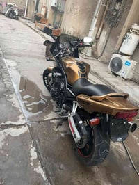 عندي دراجه هوندا مديل 2002  محرك 600 عن  الحلا ولحرام بيه لاستيك ولف ب...