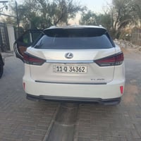 لكزز Rx450h موديل ٢٢ امريكيه محرك ٦ سلندر هايبرد فول الفول قماره بانور...
