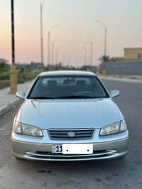 كامري 2000 رقم بغداد دولي   وارد امريكي بدون حادث فقط مصبوغه أثر جراد ...