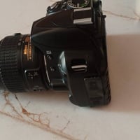 نيكون D3100 • عدسة 18-55 • مستخدمة شوي