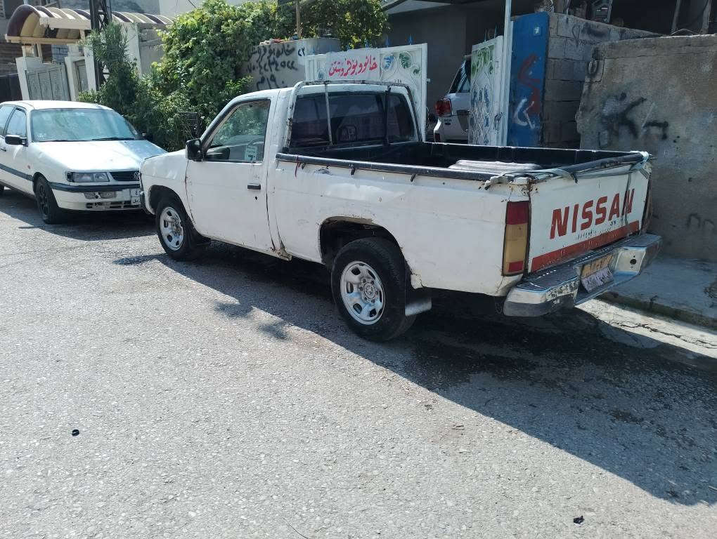 ئاڕم کۆنی سلێمانی
مۆدیل 1991
گێڕی کەمەک دەنکی دێ 
مەکینەئەکسل شانسی بێ کێشەیە
ژ.م***********
بەس فرۆشتنەزانیاری لەوێنەکانە أربيل, العراق

نص مكتوب في الصور:
- المنشورات
- پیکاب تاک نیسان 1991
- توندوتوله گیرمه کینه ئه کسل بی
- کیشه یه به شه رت هه نده ک دنگی گیری
- هه یه به س که مه
- سعرى 12$ئارم کونى سليمانيه
- له گه لدايه شوين هه وليربه حركه...ژ...م..
- ***********
- برایان به س فروستنه
- تعليق باسم Abu Muhamad