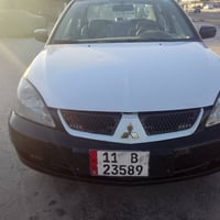 لانسر ٢٠١٠ • بدون ضربه • تحويل مباشر بغداد