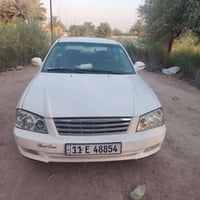 سياره للبيع اوبتيما ٢٠٠١ مكينه كير مكفولات حداديه جديده تبريد منضومه ك...