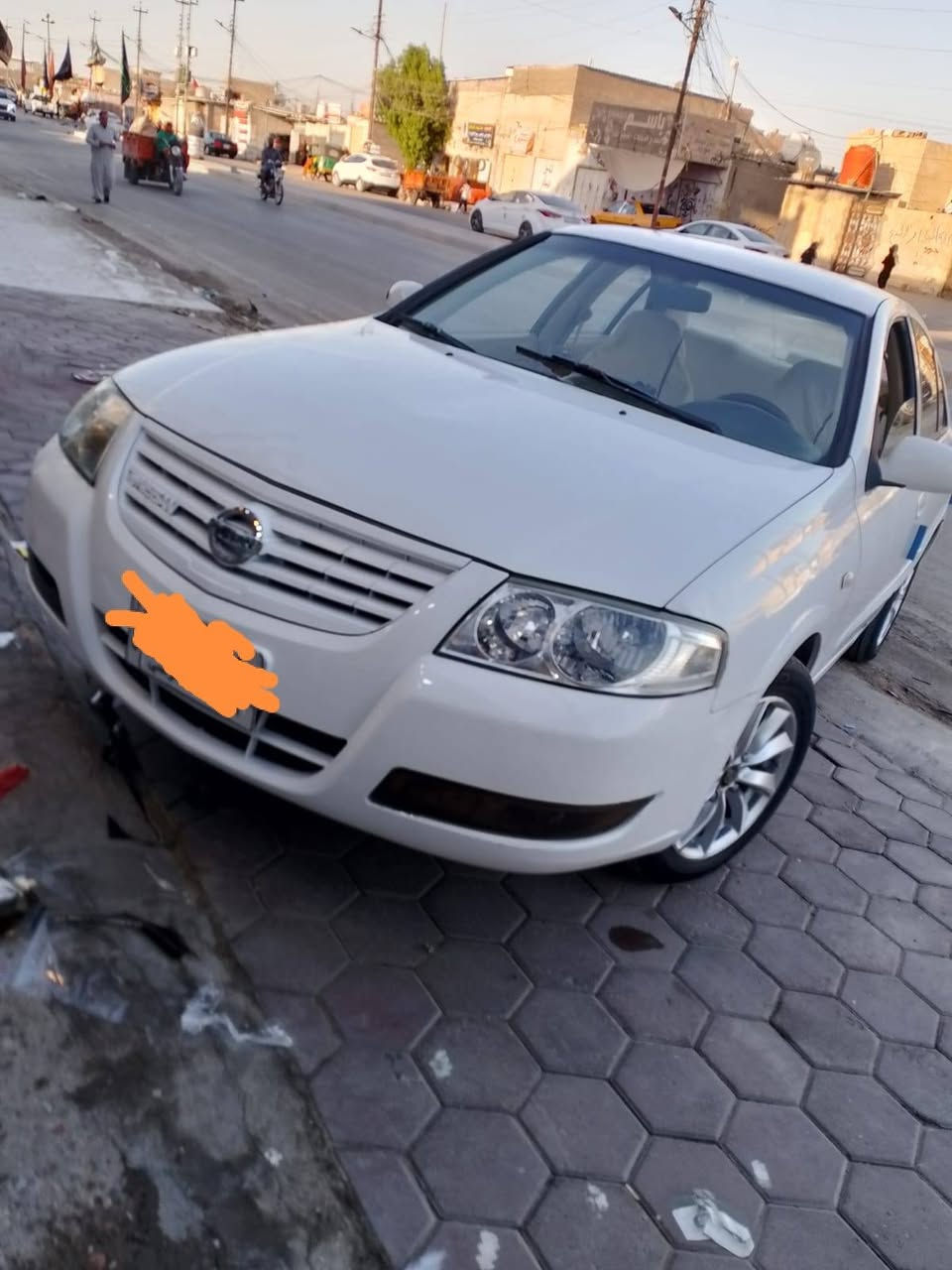 نيسان صني 2013 السياره بيها حادث الجاملق الخلفي وبيه طلقه بل قمار سعر 75.قفل *********** البصره
