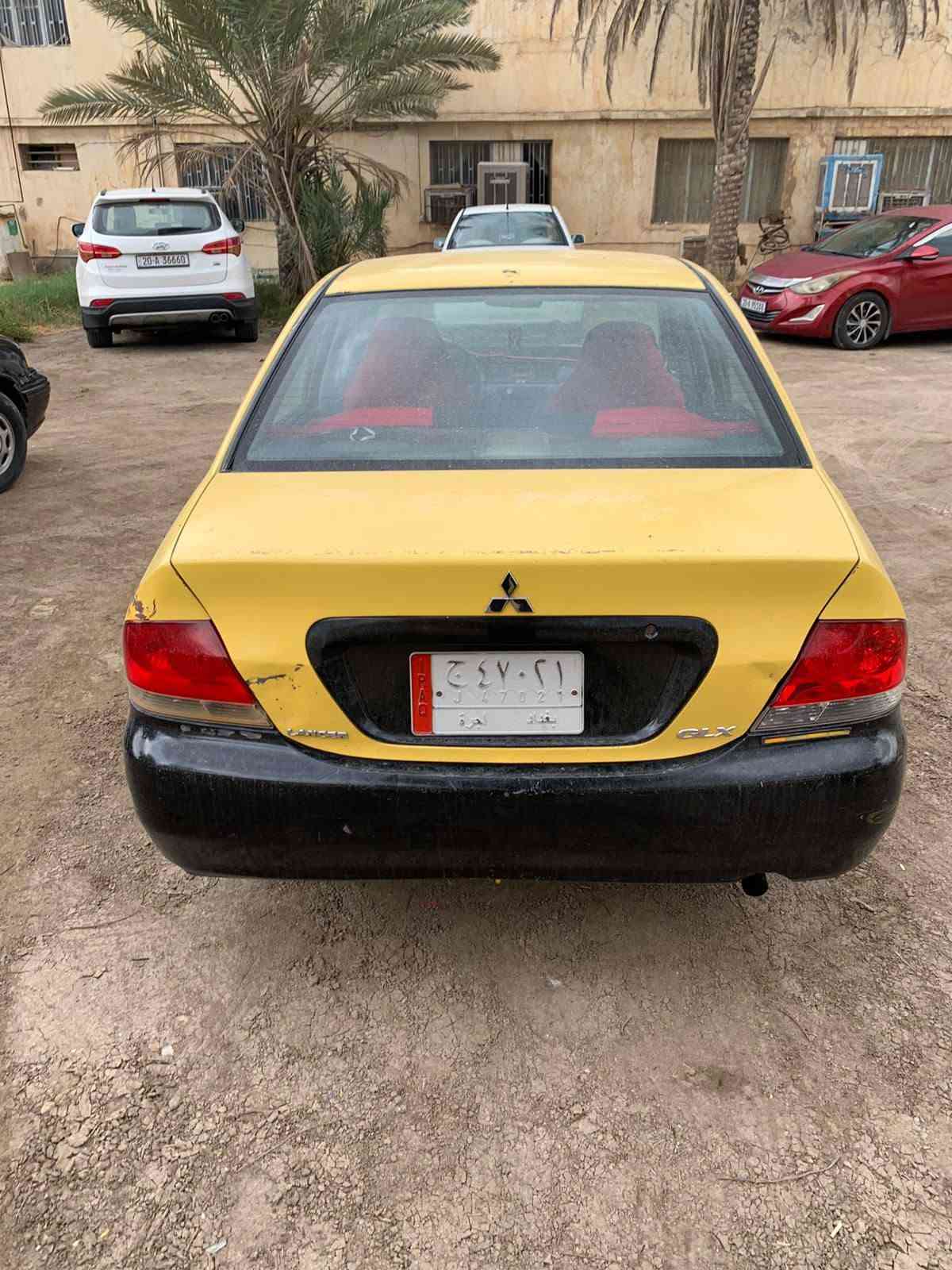 لانسر ٢٠٠٩ • محرك مكفول • رقم بغداد