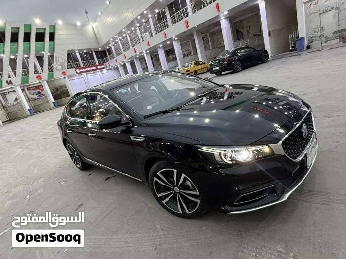 MG 6 THROGHY 
MG6 الفول مواصفات
مرقم بصره بأسمي رقم دولي 
عداد المسافة 32 الف كيلو
محرك 1.5 تيربو
ناقل سرعة دبل كلتش 7 سرعات
قوة المحرك 169 حصان
عزم الدوران 250 نيوتن / متر
مصابيح نهارية LED
مصابيح خلفية LED
مرايا كهربائية
اشارات في المرايا الكهربائية
مرايا قابلة للطي بشكل الكتروني
مقود جلد
مكابح توقف الكترونية EPB
مكابح انتظار الكترونية Auto Hold
نظام الثبات الالكتروني ESP
نظام توزيع قوة الكبح EPD
نظام مكابح المنعطفات CBC
نظام مراقبة ضغط الهواء في الاطارات
تكييف الكتروني ثنائي المنطقة
نوفذ كهربائية مع فتخ واغلاق اوتوماتيكي
مثبت سرعة
ناقل سرعة في المقود ( بادل شيفتر )
بصمة
مسند يد خلفي مع حامل اكواب
مقود قابل للتعديل
شاشة 8 انش مع كاميرا
بلوتوث
مداخل USP مع شاحن
مداخل كهرباء 12 فولت
Android Auto
Apple Car Play
تحكم بالمقود
حساس خلفي
شاشة عدادات 3.5 انش
عادم مزدوج ) دبل اكزوزت ( فتحة سقف
دوسات بنزين وبريك معدنية رياضية
جنط 18 المنيوم
اطارات بروجستون
مقاعد جلد
مقعد سائق كهربائي ب 6 حركات
6 وسائد هوائية
نوفذ كهربائية مع فتح واغلاق اوتوماتيكي لجميع
النوافذ
نظام الاضاءة التلقائية
اغلاق النوافذ تلقائيا عن قفل السيارة

ضمان 6 سنوات او 200,000km ايهما اقرب

التواصل على الرقم ***********

نص مكتوب في الصور:
- السوق المفتوح OpenSooq