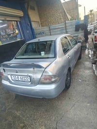 لانسر بومه ٢٠٠٨ اوتوماتيك محرك ١٦٠٠ فتحة سقف كشنات جلد شاشه رقم بغداد ...
