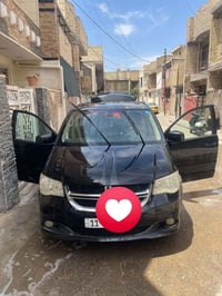 دوج كرفان موديل 2013 مصبوغة حزام حادثها الجاملغ الخلفي الي من جهة السا...
