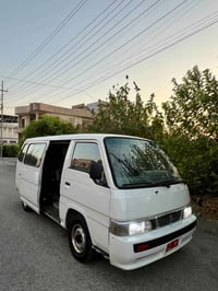 غاز وبنزين • ١٤ راكب • موديل ٢٠٠١