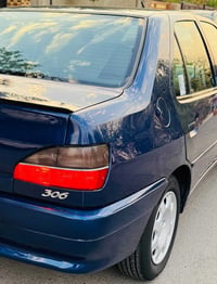 بيجو ٣٠٦ • ٢٠٠٢ • رقم بغداد