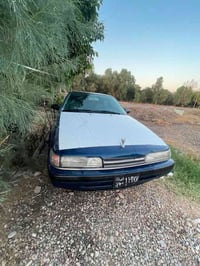 مازدا ١٢ • بوياج أبيض • كالار