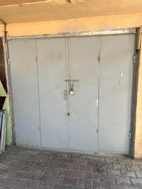 بيبان دفتري • حديد ثقيل • سقيفة ١١٫٥م×٦٫٥م
