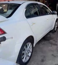 لانسر قرش 2015 خليجي مكفولة عدا بارد   حساسات وكاميرة وتحكم ستيرن   مك...