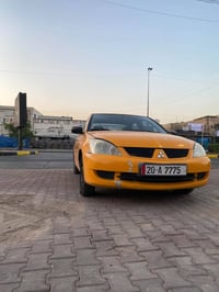 لانسر ٢٠٠٩ • ١٦٠٠ كير اوتو • رقم ٢٠ ديالى
