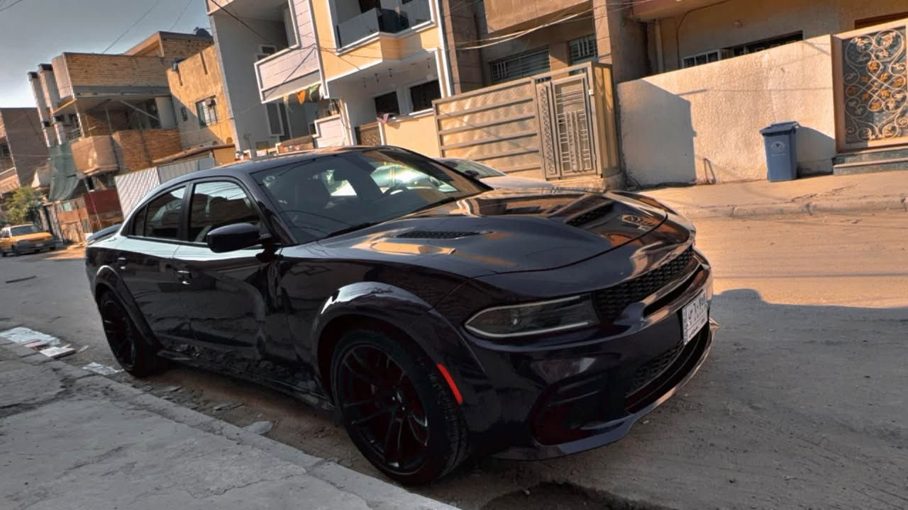 دوج جارجر سكات باك وايد بدي للبيع او مراوس 
‎الموديل:2022 . 
‎المحرك : SRT . V8 . 6.4L .
‎العداد : 25 الف ميل ) .
‎ المواصفات :
‎* وايد بدي . 
‎* مكابح رياضية (برمبو) . 
‎* لايت LED . 
‎* نقطة عمياء . 
‎* كاميرا خلفية . 
‎* امكانية التحكم بوضعيات المقود كهربائيا . 
‎* كزوز سستم . 
* ولف حماوة ريسنك 82 
* اويل كاج كان 
‎* حساسات خلفية . 
‎* ويل قياس 20 أنج 
‎* سستم صوت ALPINE . 
‎* تشغيل عن بعد . 
‎* مقاعد رياضية من الجلد الفاخر . 
‎* ذاكرة لحفظ وضعيات الجلوس (ميموري) . 
‎* المقاعد الأمامية تبريد وتدفئة . 
‎* نظام خرائط GPS . 
‎* شاشة كبيرة قياس 8.4 أنج اوپشنات SRT 
‎* تدفئة ستيرن . 
‎* كير شفتر بالستيرن . 
‎* بلوتوث تلفون . 
‎* محدد سرعة .
السيارة مبرمجة يم مصطفى ايكل 
رقم التليفون 
*********** بغداد, العراق

نص مكتوب في الصور:
- الدليمي 1:36 PM