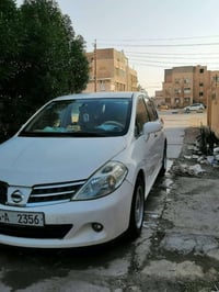 لاتصال07726882395 سلام عليكم نيسان تيدا للبيع موديل 2006 محرك 1600 كير...