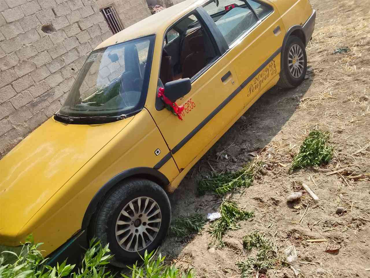 بيجو ٢٠٠٥ • رقم بغداد • راعيه نجف