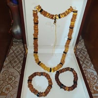 عقد مع سورات كهرب بولوني حر طبيعي مع فيديو الفحص بالاشعه البنفسجية UV ...
