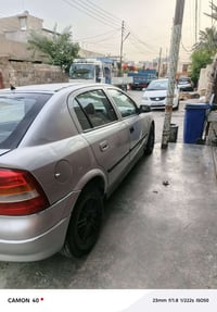 أوبل أسترا ٢٠٠١ رقم بغداد بلاديه السياره كير أوتوماتيك سياره بالكارتون...
