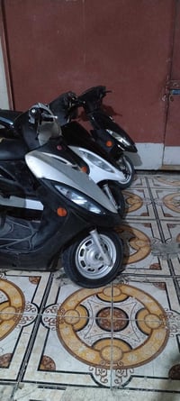 دراجات نوع كامكو محرك حاويه كفاله  07711741388  جاهزات  07828711780
