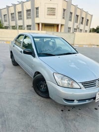 لانسر ٢٠١٠ • محرك ١٫٥ • خليج رصاصي