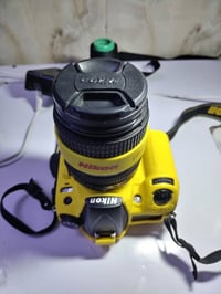 نيكون D7000 • عدسة ١٨-١٤٠ • بابل