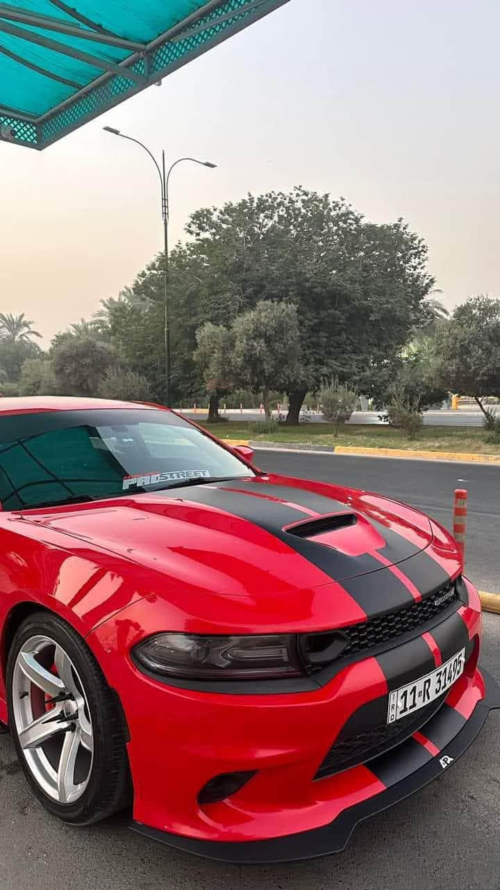 DODGE CHARGER R/T2020
دوج تشارجر
وارد امريكي  
موصفات 
:شاشه كبيره
:كشنات حضن
:تشغيل عن بعد 
:نضام سبورت 
:سستم صوت الباين
السعر 230  
لون : احمر
محرك5.7
ماشيه:50 الف mile
حادث سطحي جاملغ ونبيد بدون دواخل
السياره باسمي التحويل ثاني يوم 
العنوان بغداد . المنصور 
***********

نص مكتوب في الصور:
- قحطان الصفار سمكرة PDR فحص السيارة تكحيل صبغ بوليش تقرير الفحص النهائي : الماركة : دوج النوع : جارجر سنة الصنع : 2020 رقم العجلة : R/11/31495 خصوصي رقم الهيكل : 2C3CDXCT8LH216943 تاريخ الفحص : 2025-01-21 وقت الفحص : 04:21 pm ملاحظة : نخلي مسؤوليتنا بعد انتهاء الفحص وتسليم التقرير الى الزبون. قحطان الصفار سمكرة و صبغ و فحص السيارات الجانب الايمن يوجد رصعات الجانب الايسر يوجد صبغ في المكان المحدد المصد الخلفي لايوجد ضرر / لم يتم فحص ماتحت الفابلون الجزء العلوي المصد الامامي الدعامية والبينيد صبغ/ يوجد ضرر بكتف اللغد الايسر/ يوجد ضرر بسيط بقاعدة البراكيت الايسر تقرير الفحص النهائي للعجلة المرقمة R/11/31495 - خصوصي بتاريخ 2025-01-21 في الساعة 04:21 pm *********** قحطان الصفار لسمكرة وصبغ السيارات بغداد - شارع الربيع - قرب مطجنة الجلبي - مقابل الحرية