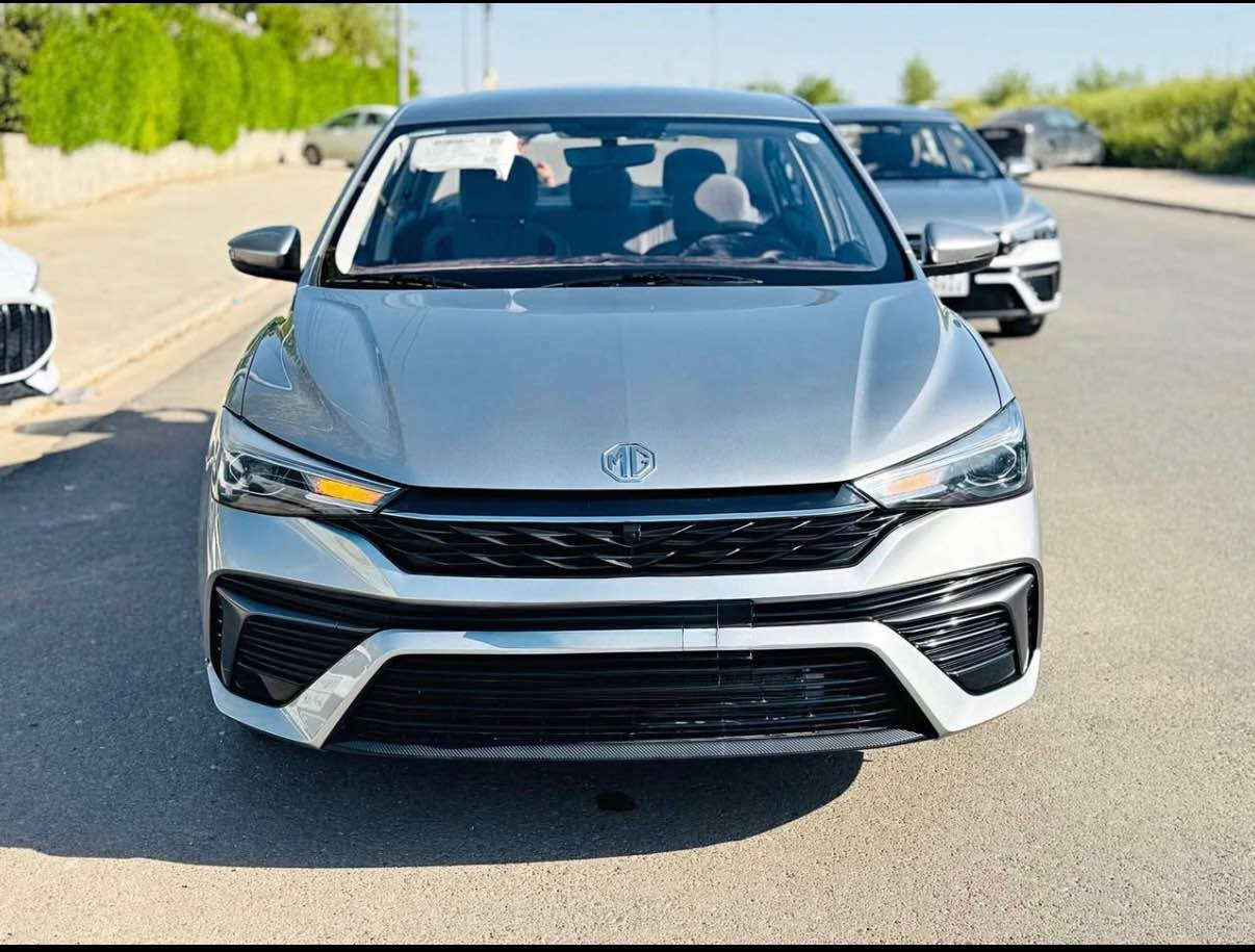 ﷽ 
‏MG 5 comfort 2025  
سەیارەکە شکڵ نوێ یە ئۆکتان 91 بەهیج جۆرێک دیلکۆ لێنایەت پێش و دوا لید لایت لایت زینۆن عەدەسە ویل کڕۆم دەسک بەسمە ئۆتۆ هۆڵد برێک کارەبایی تاعدیل سورعە سوکان ڤۆلیۆم تەبرید مەرکەزی دوو بەسمەی لەگەڵایە سەیارەکە لە سلێمانیە  بەناوی خۆمانەوەیە سەیارەکی زۆر جوان و نازدارە 
ژمارەی خاوەنی:*********** السليمانية, العراق
