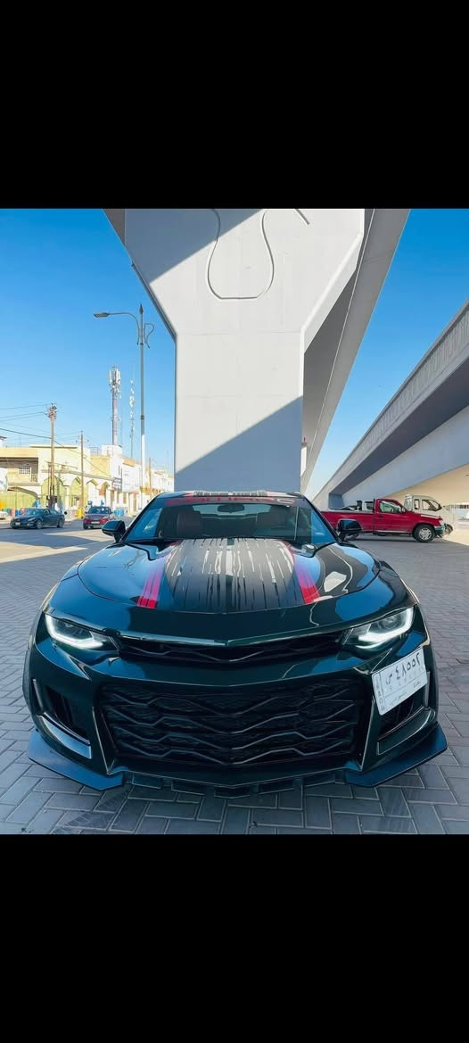 السلام عليكم 
كمارو موديل 2020 
لون مميز زيتوني
مكينة6 سلندر  3600
السعر 112$
بيع فقط 
وارد امريكي حادثها الجاملغ الايمن وشويه 
بالبنيد صبغ والجاملغ الثاني كلير
محرك وكير مكفول من الفتح 
كير 10 نمر 
ايرباك طاك الستيرن والبرده
مواصفات 
1 غرفة جلد لون احمر
2 كشنات كهرباء عدد2
3شاشة كبيرة تدعم كار بلي 
4 وضعيات قياده عدد3
5 كامره دواره
السيارة ماشيه. 105 الف ميل 
رقم بغداد باسمي تحويل مباشر 
العنوان صلاح الدين الضلوعية 
***********

نص مكتوب في الصور:
- realme Shot on realme Q3 Pro Special
- ١٧:٣٩ ٢٠٢٦/٠٧/١٩