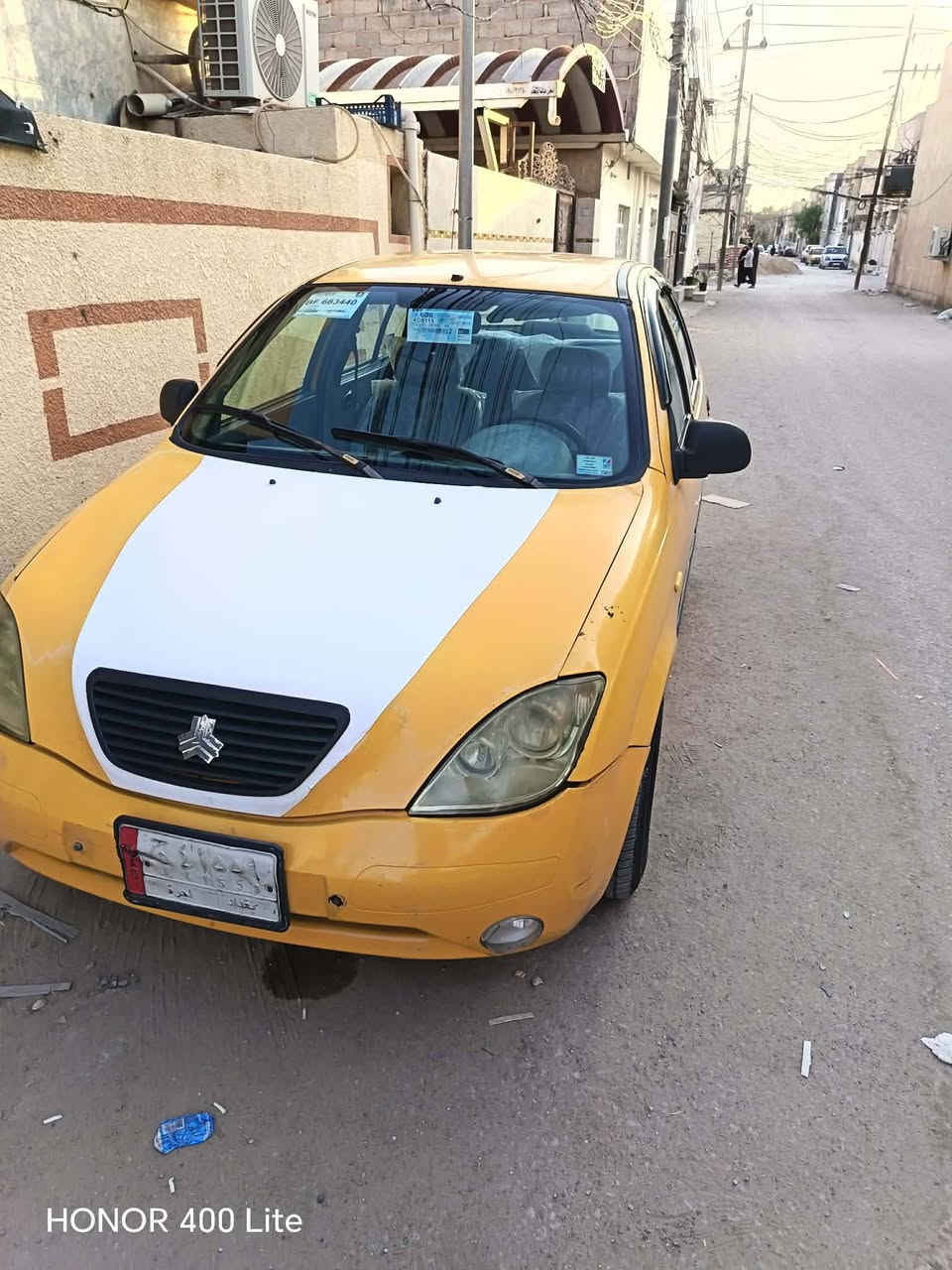 السلام عليكم طيبه للبيع موديل 15رقم بغداد سنويه جديد مصفرة هيه وغرامات تحويل مباشره  مكينه وكير وحداديه كله تمام سعرها 23ورقه مكاني كربلاء رقم التليفون ***********

نص مكتوب في الصور:
- HONOR 400 Lite