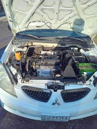 لانسر موديل 2006 محرك 1300 تبريد ثلج لاستفسار 07705513487