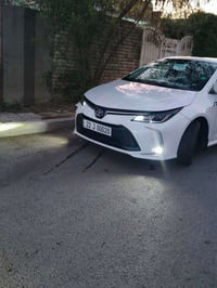 كورلا ساز 2023  السياره بأسمي استلام شركة  كفاله عامة  بيها ٣ رضعات فق...