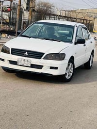 لانسر • ٢٠٠٢ • رقم بغداد