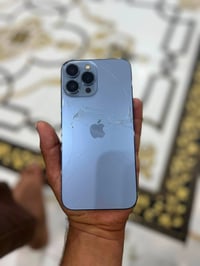 جهاز أيفون 13 برو ماكس للبيع  مكفول من كلشيء بس ظهر شويه متأذي  بطاريت...