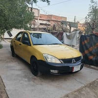 لانسر ٢٠١٠ • رقم ديالى • كير عادي