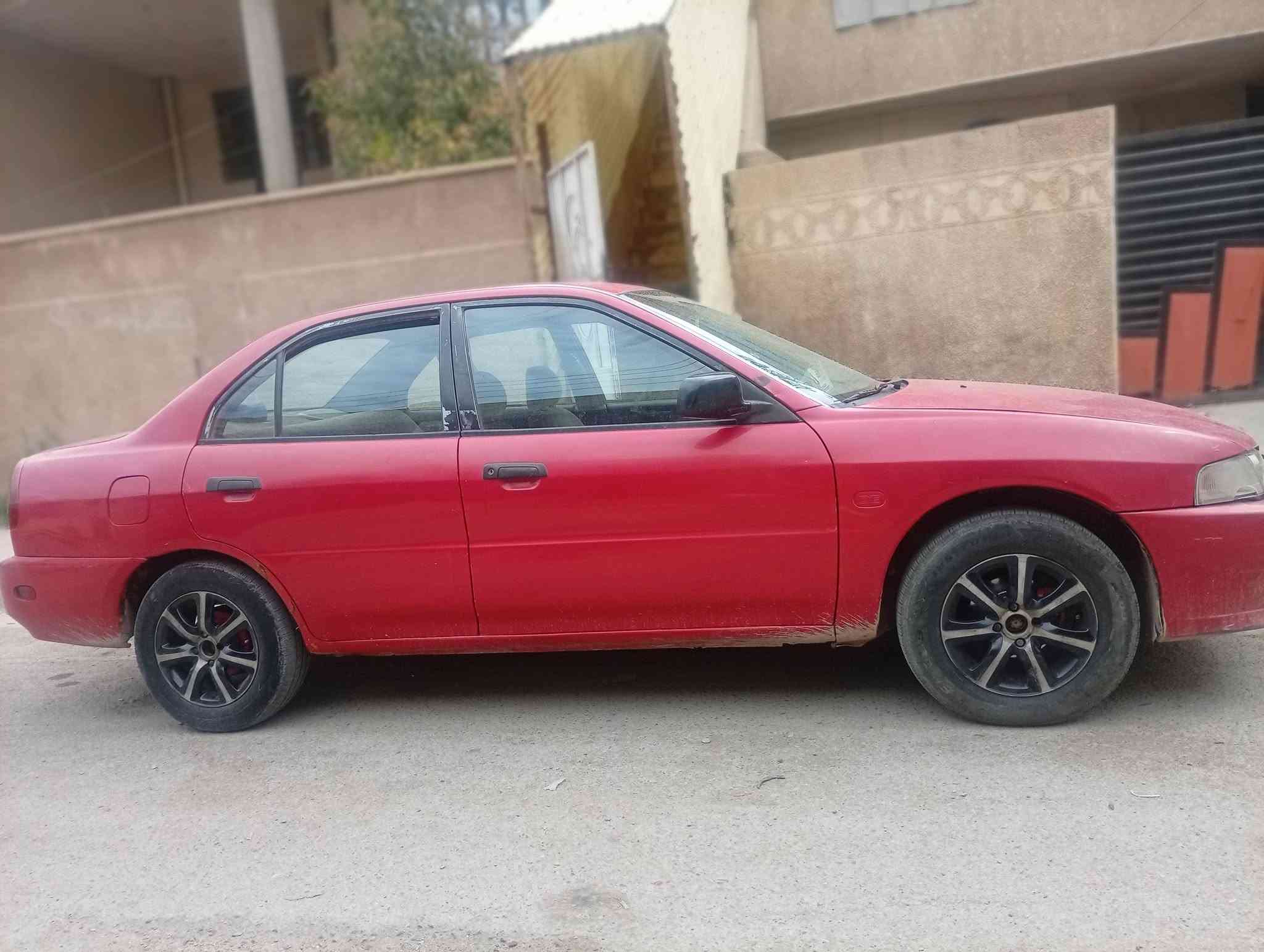 لانسر ١٩٩٧ • اوتوماتيك • رقم بغداد