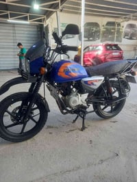 بوكسر • باجاج • ٢١